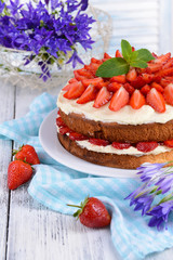Delicious biscuit cake with strawberries