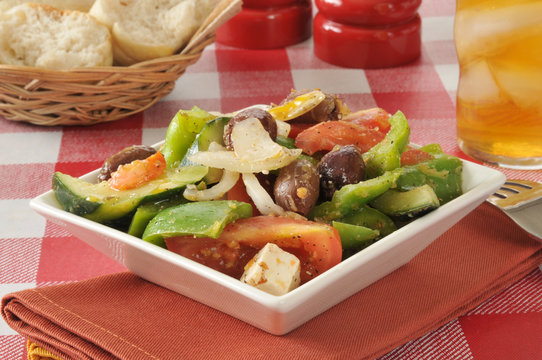 Greek salad with rolls