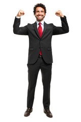 Handsome manager raising arms in sign of victory