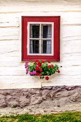 Detail of colorful window on old traditional house