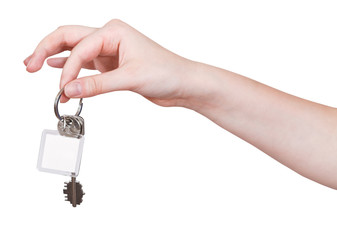 hand with keys and blank key fob isolated