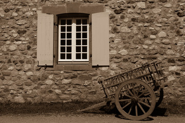 Fototapeta na wymiar Old wagon wood window open stone wall