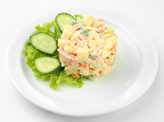 Russian traditional salad Olivier, isolated on white
