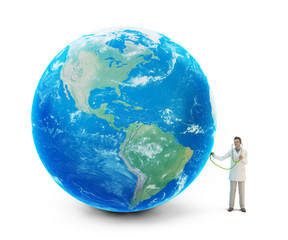 Tiny doctor with a globe