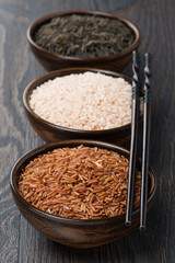 Assorted rice in bowl and chopsticks
