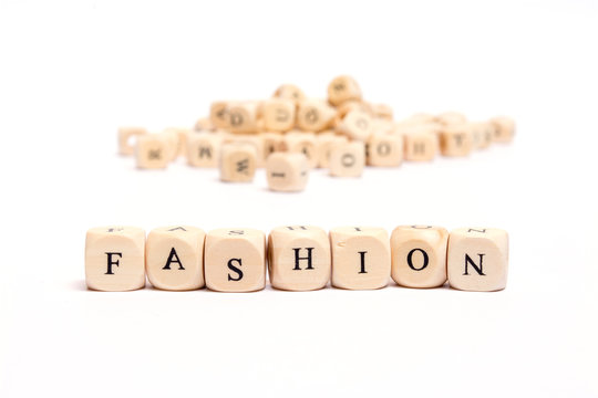 word with dice on white background- fashion