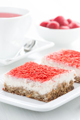 cream cakes with raspberries, selective focus