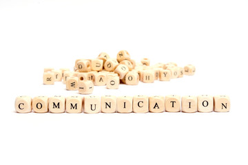word with dice on white background- communication