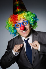 Clown businessman in funny concept