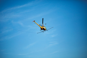 Crop sprayer duster helicopter, spraying mountains, fields and l