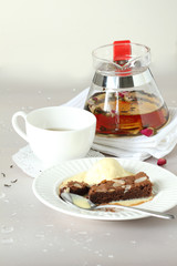 Cup of tea with teapot