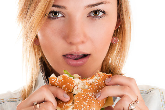 Portrait Woman Closeup Eating A Hamburger