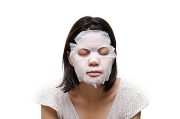 Woman using  facial mask