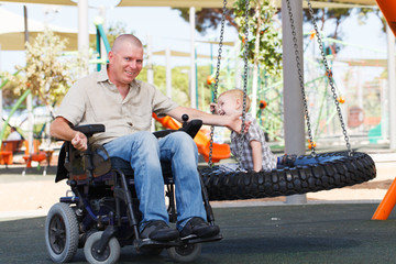 Dad play with son outdoor at park