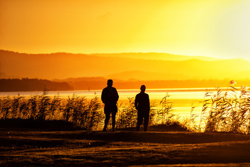 Romantic couple take a sunset walk 