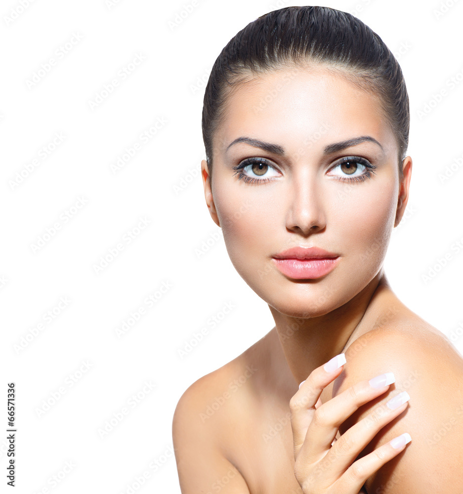 Wall mural beautiful face of young woman with clean fresh skin