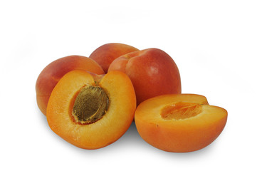 Several ripe apricots isolated on white background