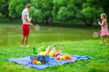  Picnic basket with fruits, bread and bottle of white wine © travnikovstudio