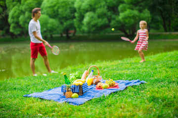 Happy family picnicking in the park