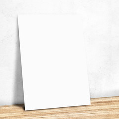 blank white paper on the white wall and the wooden floor,Mock up