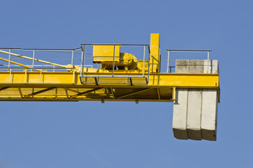 crane construction fragment with concrete weight