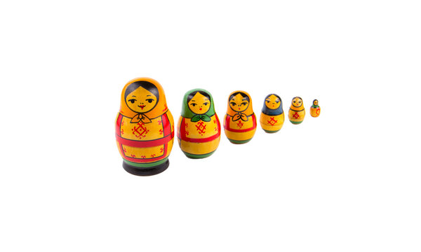 Russian Traditional Wooden Dolls Isolated On White Background