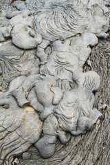 Naklejka premium Textures of black lava (pahoehoe) in Santiago island