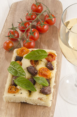 mediterranean flat bread on wooden board