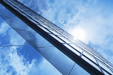 Fototapeta na wymiar Details of modern building with sky background