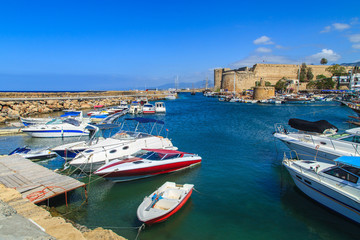 Boats in a port of Kyrenia (Girne), castle in the back, Cyprus