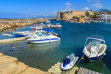 Fototapete Stadt am Wasser Boats in a port of Kyrenia (Girne) with a castle, Cyprus