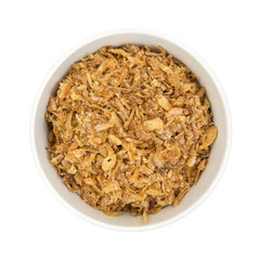 Bowl of deep fried onions on a white background