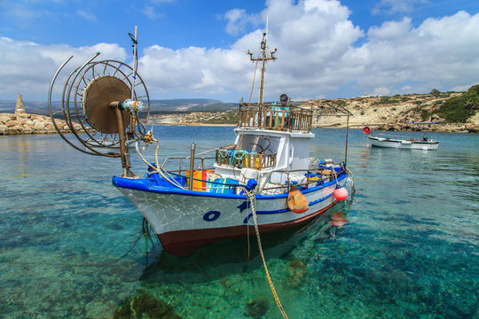 Fototapeta Fishing boats in a port in Pafos, Cyprus
