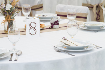 an image of tables setting at a luxury wedding hall