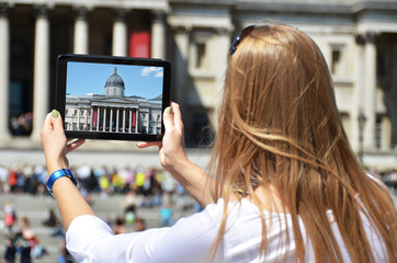 The National Gallery on the screen of a  tablet. Trafalgar squar