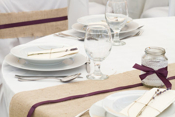 an image of tables setting at a luxury wedding hall