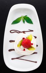Meringue nest with strawberry