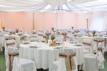 an image of tables setting at a luxury wedding hall