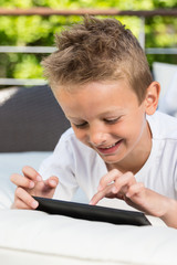 Close-up of boy with tablet