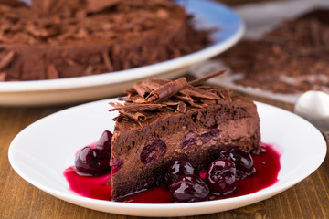 Chocolate mousse cake with dark cherries