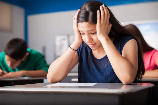 Worried teen taking a test