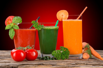 Fresh juice, healthy drinks on wooden table.