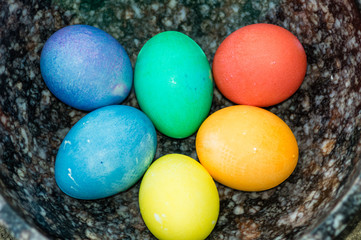 Fototapeta na wymiar Bowl with dyed hard boiled eggs