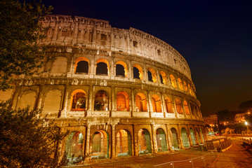 Fototapeta na wymiar Stunning view of Colosseum at night, Rome - Italy