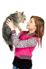 smiling young girl with her pet yorkshire