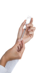 hands holding syringe and insulin vial