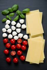 Naklejka na ściany i meble Italian ingredients - basil, tomatoes, cheese and lasagna sheets