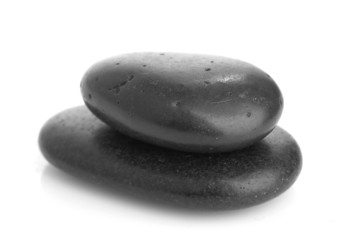 Growing piled up pebbles on a white background