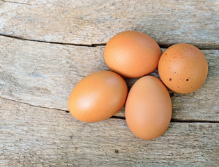 Eggs on wood background
