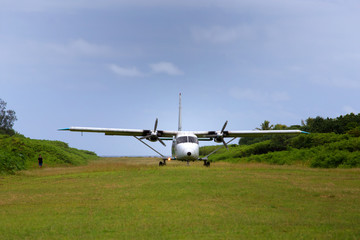 Naklejka na ściany i meble Plane takes off from Mystery Island, Vanuatu